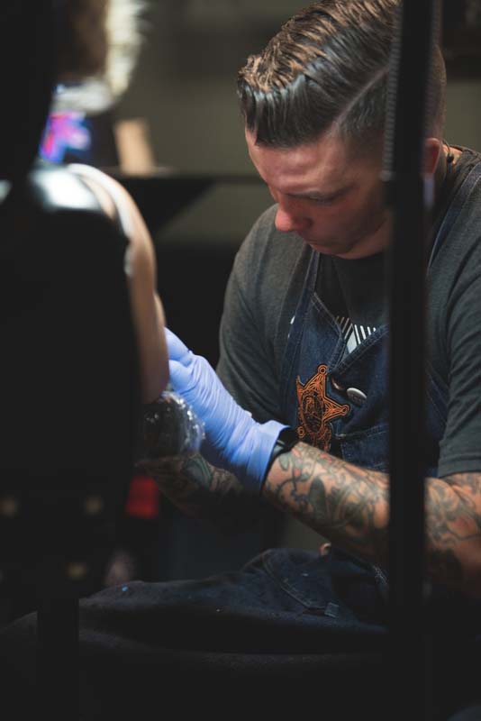 Son of fallen Florence police officer honors father with tattoo